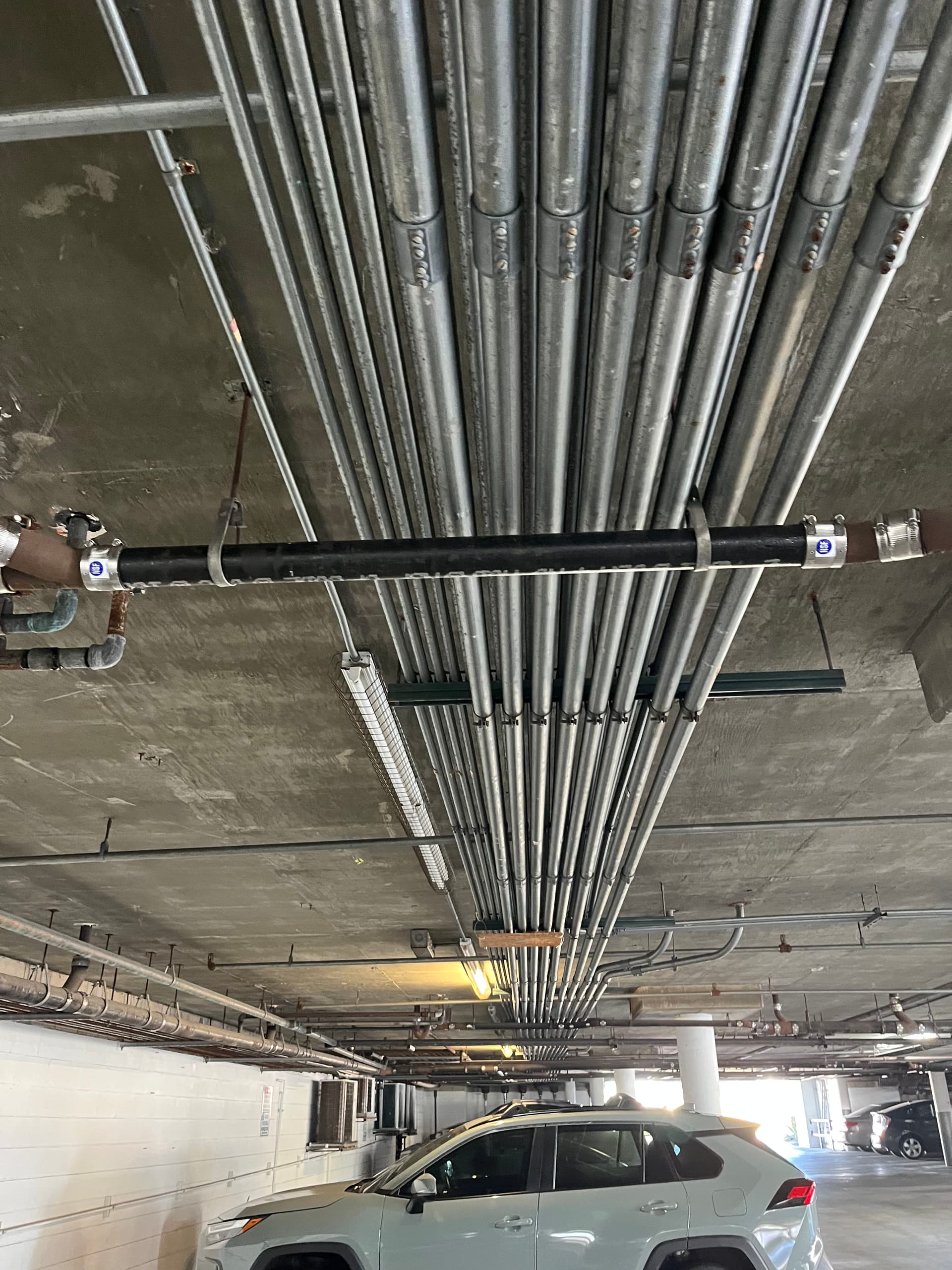 Seamless Pipe Upgrade for Apartment Parking Garage