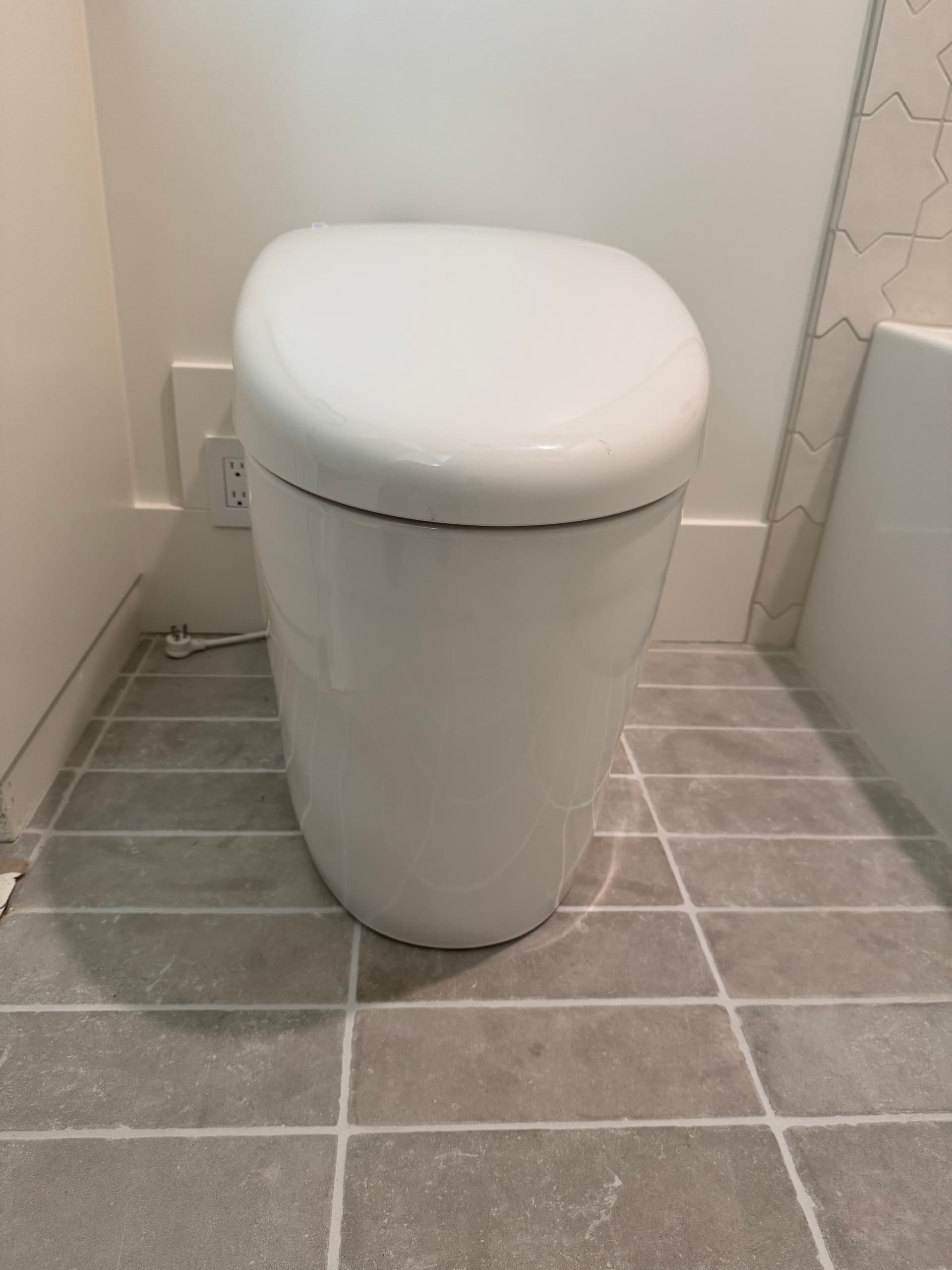 Stunning Bathroom Remodel - Featuring Sleek Fixtures and Innovative Design