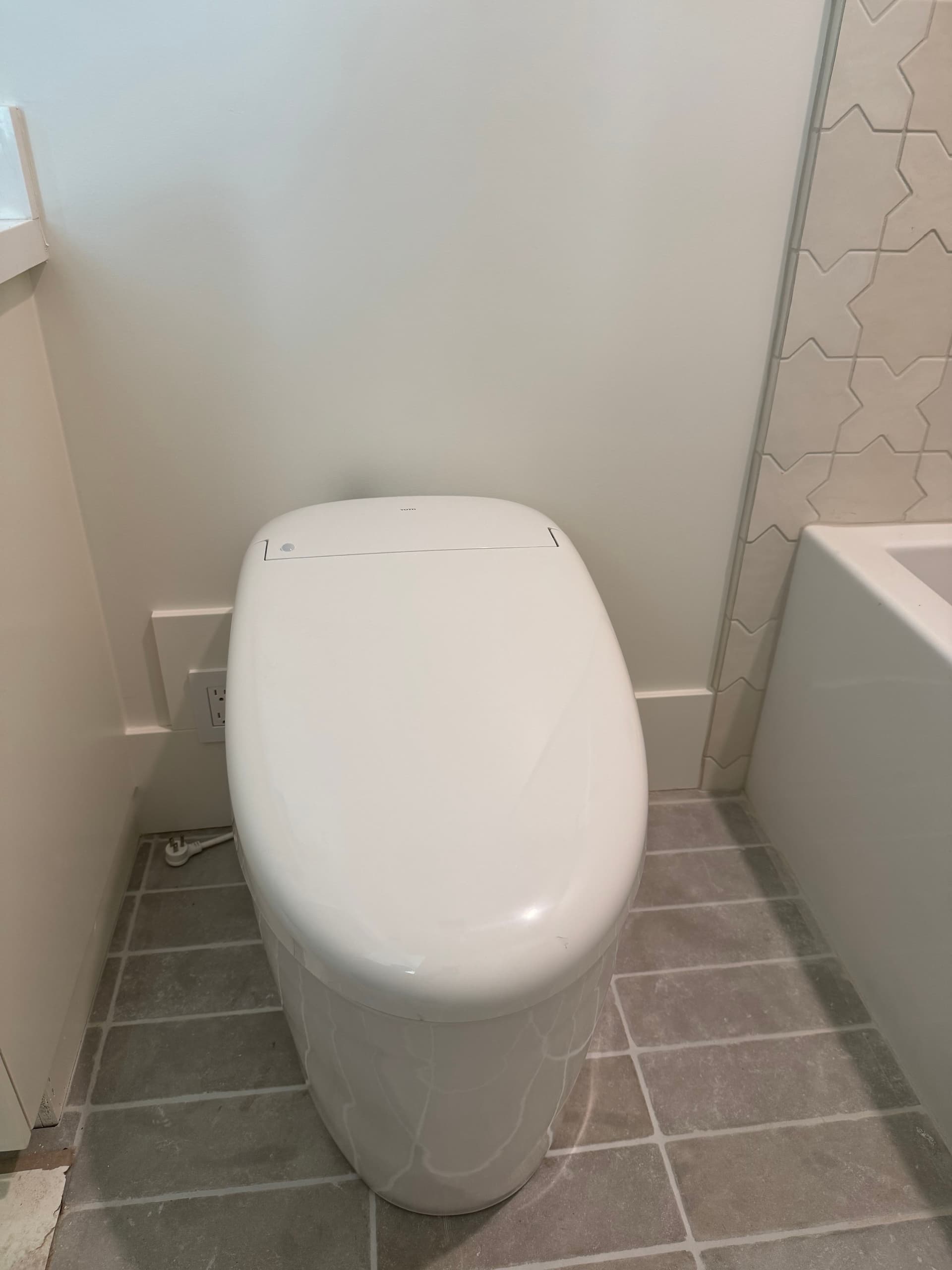 Stunning Bathroom Remodel - Featuring Sleek Fixtures and Innovative Design